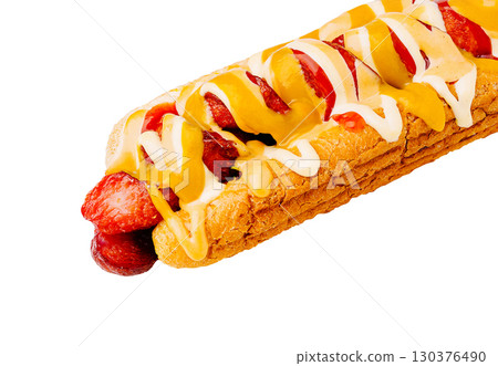 Delicious sausage sandwich with mustard and mayonnaise toppings served on a bun Delicious sausage sandwich with mustard and mayonnaise toppings served on a bun 130376490