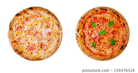 Two delicious pizzas with different toppings served on wooden plates Two delicious pizzas with different toppings served on wooden plates 130376526