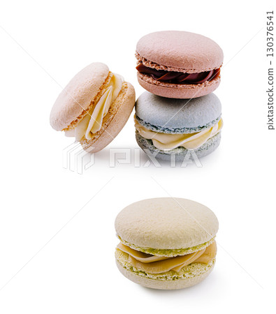 Colorful macarons displayed in a tempting arrangement on a white background Colorful macarons displayed in a tempting arrangement on a white background 130376541