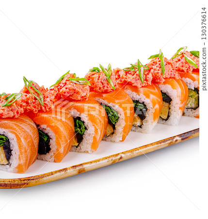 Fresh sushi rolls arranged beautifully on a traditional platter for dining Fresh sushi rolls arranged beautifully on a traditional platter for dining 130376614