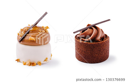 Delicious chocolate desserts decorated with elegant toppings in a clean setting Delicious chocolate desserts decorated with elegant toppings in a clean setting 130376699