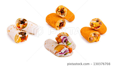 Delicious wraps featuring fresh ingredients displayed on a white surface Delicious wraps featuring fresh ingredients displayed on a white surface 130376708