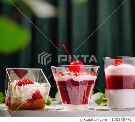 Delicious desserts with layers of flavors presented elegantly on a table 130376771