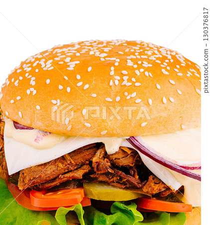Gourmet pulled pork burger with fresh vegetables on a sesame seed bun Gourmet pulled pork burger with fresh vegetables on a sesame seed bun 130376817
