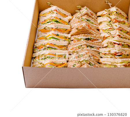 Delicious assortment of layered sandwiches prepared for a gather 130376820
