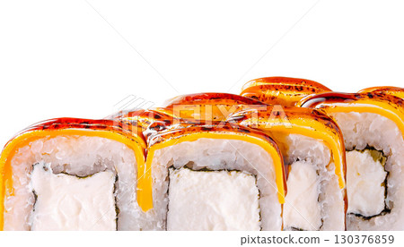 Delicious sushi rolls with creamy filling and glossy sauce ready to enjoy Delicious sushi rolls with creamy filling and glossy sauce ready to enjoy 130376859
