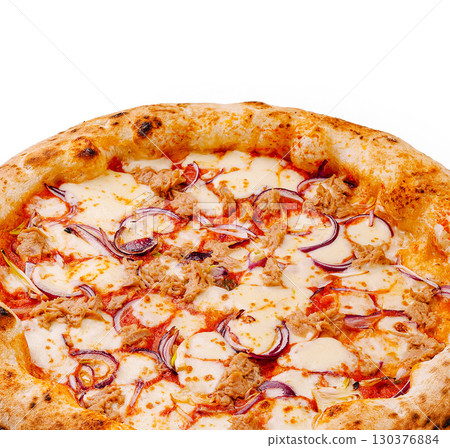 Freshly baked pizza topped with cheese, tuna, and onions in a cozy setting Freshly baked pizza topped with cheese, tuna, and onions in a cozy setting 130376884