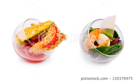 Delicate appetizers served in unique glass bowls at culinary event Delicate appetizers served in unique glass bowls at culinary event 130376975