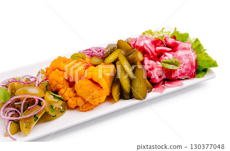 Colorful appetizer platter featuring pickles and vegetables perf Colorful appetizer platter featuring pickles and vegetables perf 130377048
