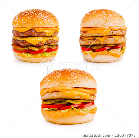 Indulging in delicious cheeseburgers with fresh toppings and flavors 130377075