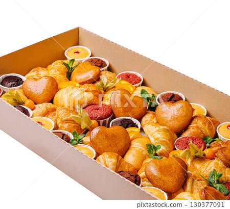 Delicious assortment of baked goods in creative arrangement for celebration Delicious assortment of baked goods in creative arrangement for celebration 130377091