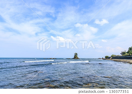 The female rock formations of Toyama Bay seen from Amaharashi Coast in Takaoka City 130377351