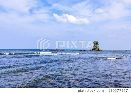 The female rock formations of Toyama Bay seen from Amaharashi Coast in Takaoka City 130377357