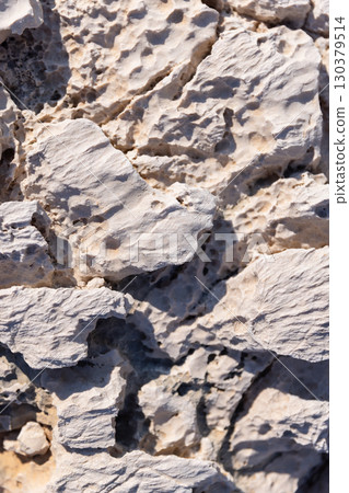 White coastal rocks, top view. Natural background photo texture White coastal rocks, top view. Natural background photo texture 130379514