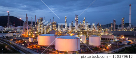 Aerial view oil and gas refinery plant at night, Global business energy logistic transportation, Oil and gas refinery petrochemical industrial, Petrochemical refinery industrial energy supply chain. 130379613