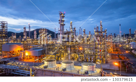 Aerial view oil and gas refinery plant at night, Global business energy logistic transportation, Oil and gas refinery petrochemical industrial, Petrochemical refinery industrial energy supply chain. 130379615