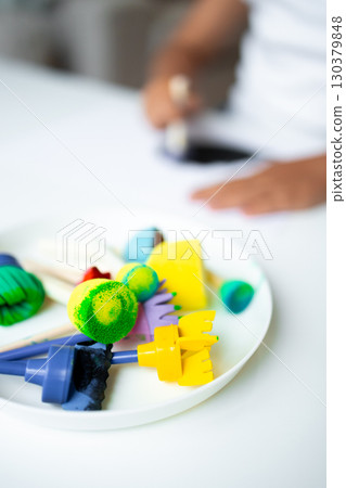 Colorful children art tools on a plate for creative play Colorful children art tools on a plate for creative play 130379848