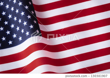Close up USA flag. American Flag Wave Independence Day 4th of July. American flag for Memorial Day, 4th of July, Labor Day. Patriotic Symbols USA. American flag Stars and Stripes Red, White, and Blue 130381907