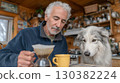 Man with gray hair is brewing coffee in a cozy cabin kitchen, with a curious dog watching closely, creating a warm, inviting atmosphere 130382224