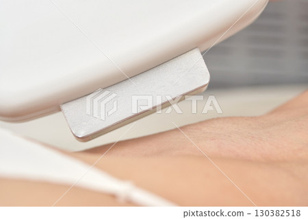 Laser hair removal on female skin with advanced cosmetic procedure for smooth Laser hair removal on female skin with advanced cosmetic procedure for smooth 130382518