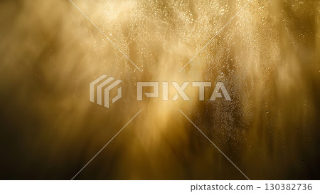 A golden background with a lot of light and dust 130382736