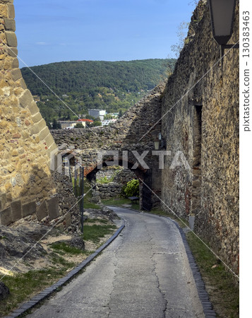 Trencin, Slovakia - August 28, 2025: The road to the gates of the ancient Trencin castle in Slovakia from the 11th century. Trencin, Slovakia - August 28, 2025: The road to the gates of the ancient Trencin castle in Slovakia from the 11th century. 130383463