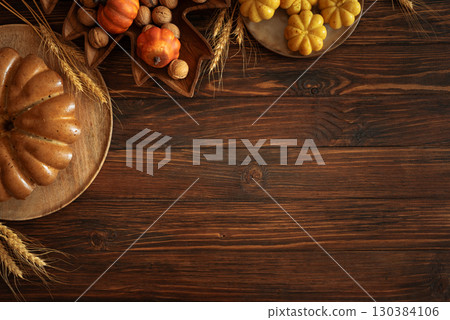 Autumn Harvest Table with Bundt Cake, Pumpkin Cookies and Seasonal Decor Autumn Harvest Table with Bundt Cake, Pumpkin Cookies and Seasonal Decor 130384106