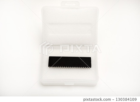 The chip is in a plastic package. An old chip. 130384109