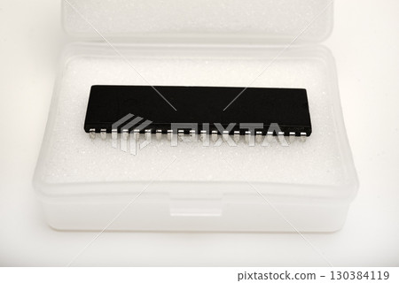 The chip is in a plastic package. An old chip. The chip is in a plastic package. An old chip. 130384119