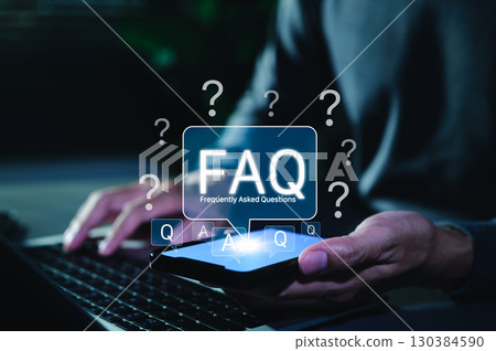 FAQ Frequently Asked Questions Digital Concept. Man holding smartphone with glowing FAQ icon above screen, symbolizing digital frequently asked questions for support, help, and information services. FAQ Frequently Asked Questions Digital Concept. Man holding smartphone with glowing FAQ icon above screen, symbolizing digital frequently asked questions for support, help, and information services. 130384590