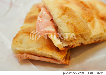 Italian focaccia with mortadella ham Italian focaccia with mortadella ham 130384694