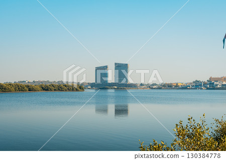 Calm water buildings. High quality photo 130384778