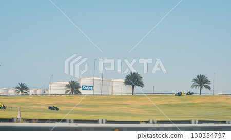 Aerial view Oil storage tank In industrial areas. Crude oil storage plant For export. Palm oil factories in Asia. Within the industrial plant. Zone tank storage industrial. Palm plantation . High 130384797