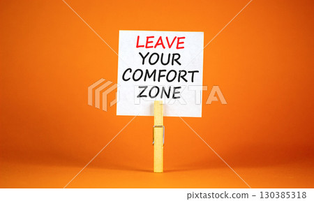 Leave your comfort zone symbol. Concept words Leave your comfort zone on beautiful white paper. Beautiful orange paper background. Business psychological Leave your comfort zone concept. Copy space. 130385318