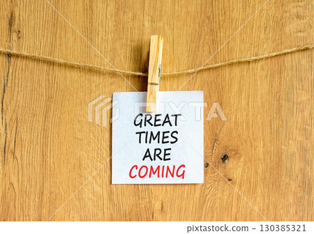 Great times are coming symbol. Concept words Great times are coming on beautiful white paper on clothespin. Beautiful wooden background. Business great times are coming concept. Copy space. Great times are coming symbol. Concept words Great times are coming on beautiful white paper on clothespin. Beautiful wooden background. Business great times are coming concept. Copy space. 130385321