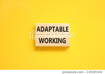 Adaptable working symbol. Concept words Adaptable working on beautiful wooden block. Beautiful yellow paper background. Business Adaptable working concept. Copy space. Adaptable working symbol. Concept words Adaptable working on beautiful wooden block. Beautiful yellow paper background. Business Adaptable working concept. Copy space. 130385342