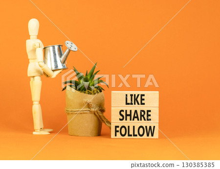 Like share follow symbol. Concept words Like Share Follow on beautiful wooden blocks. Beautiful orange background. Businessman model. Business like share follow concept. Copy space. Like share follow symbol. Concept words Like Share Follow on beautiful wooden blocks. Beautiful orange background. Businessman model. Business like share follow concept. Copy space. 130385385