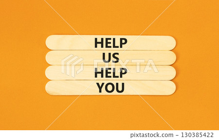 Help you symbol. Concept words phrase Help us help you on beautiful wooden stick. Beautiful orange paper background. Business Help you concept. Copy space. Help you symbol. Concept words phrase Help us help you on beautiful wooden stick. Beautiful orange paper background. Business Help you concept. Copy space. 130385422