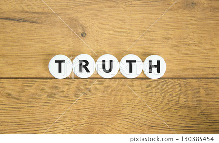 Truth symbol. Concept word Truth on beautiful white pills circles. Beautiful wooden table wooden background. Business lifestyle truth concept. Copy space. Truth symbol. Concept word Truth on beautiful white pills circles. Beautiful wooden table wooden background. Business lifestyle truth concept. Copy space. 130385454