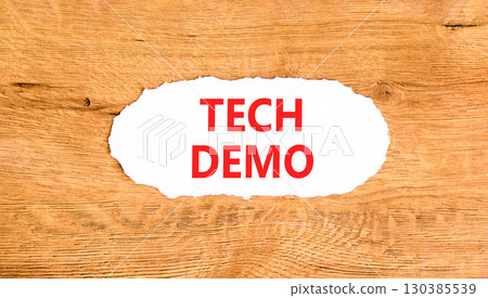 Tech demo symbol. Concept word Tech demo on beautiful white paper. Beautiful wooden paper background. Business tech demo concept. Copy space. 130385539