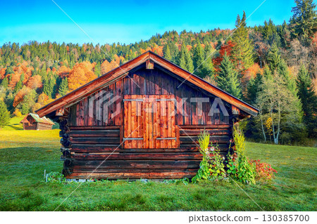 Fabulous view of alpine valley with wooden huts  near Wagenbruchsee (Geroldsee) lake 130385700