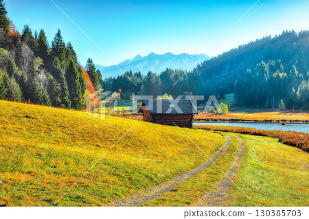 Amazing view of Wagenbruchsee (Geroldsee) lake with Karwendelspitze mountain range on background. Amazing view of Wagenbruchsee (Geroldsee) lake with Karwendelspitze mountain range on background. 130385703