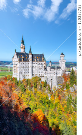 Astonishing view of famous Neuschwanstein Castle in autumn. 130385782