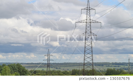 High Voltage Power Lines Set Against a Beautiful and Scenic Natural Background Environment High Voltage Power Lines Set Against a Beautiful and Scenic Natural Background Environment 130387676