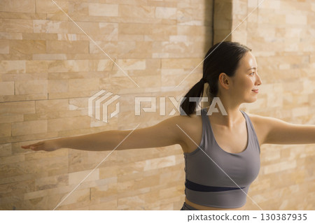A woman who plays hot yoga A woman who plays hot yoga 130387935