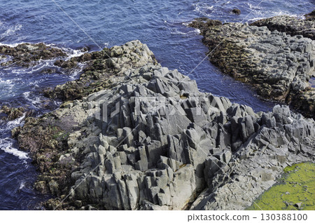 A cliff seen from a cliff A cliff seen from a cliff 130388100
