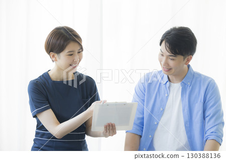 Men receiving counseling 130388136