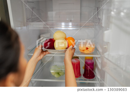 Storing Fresh Fruits in the Refrigerator Promotes a Healthy Lifestyle and Living 130389083