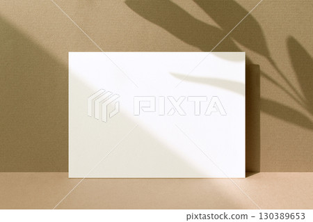 Card mockup with autumn color background and plant shadow Card mockup with autumn color background and plant shadow 130389653