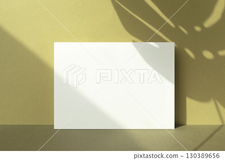 Card mockup with autumn color background and plant shadow Card mockup with autumn color background and plant shadow 130389656